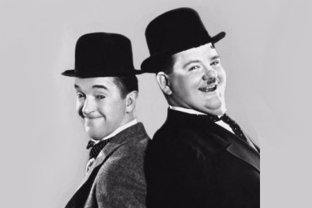 a black and white photo of laurel and hardy